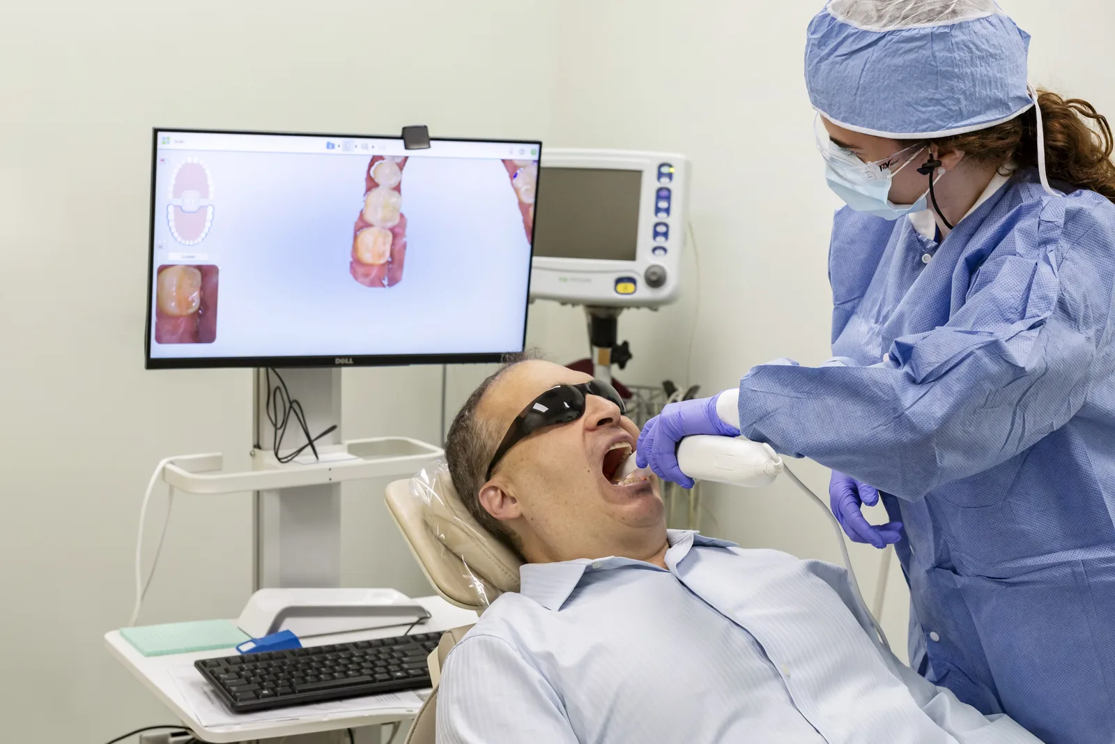 A digital impression scan being taken during dental treatment